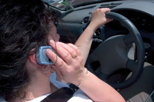 Driver holding a mobile phone
