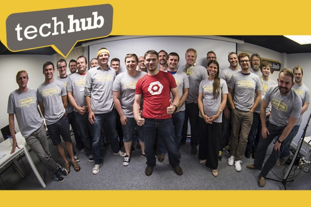 members of the Hackathon team standing together in a room a the Techhub
