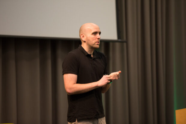 Simon Wheatcroft speaking to audience