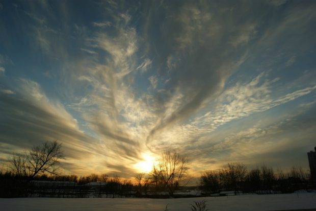 Winter sky with low setting sun