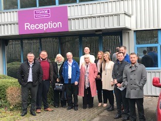 Group of people standing outside Ecycle reception