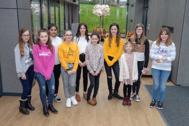 a group of girls standing together